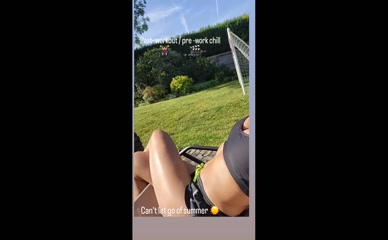 Rebecca Sarker in sports bra and shorts.