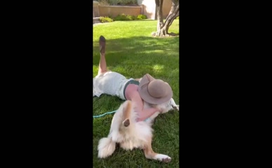 Britney Spears nipple slip dog petting