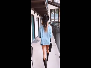 Sophia Scott ass cheeks in bikini bottoms and boots.