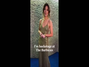 Carly Paoli cleavage slip dress.