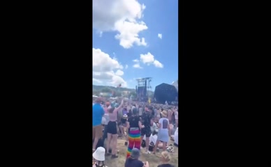 Maisie Williams topless at Glastonbury