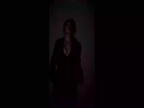 Dafne Keen exposed upper breasts