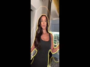 Maya Jama in black catsuit dances and poses