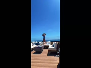 Ella Horan: Swimsuit Cleavage and Bare Back Exposure.