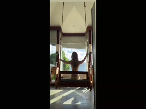 Georgia Toffolo topless swing.