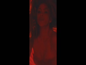 Shakira topless perfume ad