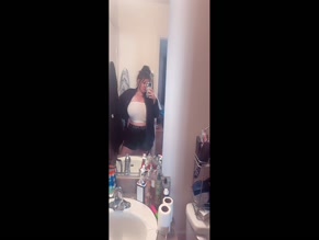 Wildfantasygirl69's bathroom selfie with visible breasts