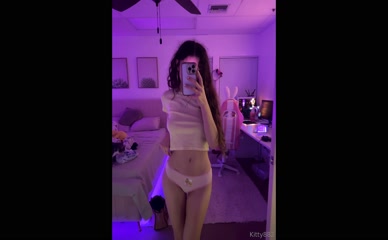 Kitty882 mirror selfie in panties and crop top.