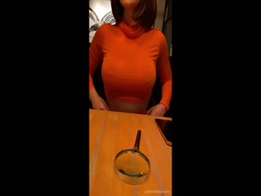 simoniliciousxxx reveals large breasts under orange top