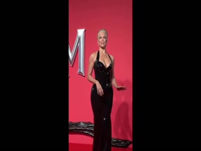 Hannah Waddingham latex dress cleavage.