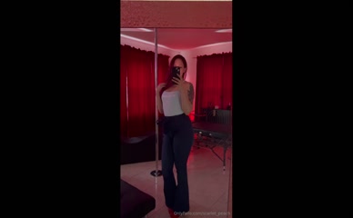 scarletpeach mirror selfie in tank top and pants
