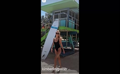 Kimberley Garner swimsuit beach walk