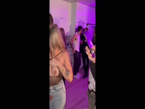 Itsabbyroseof hot MILF seducing a man at a party