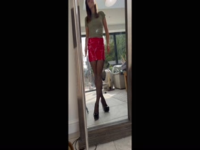 theenglishrose3 in red vinyl mini skirt and stockings