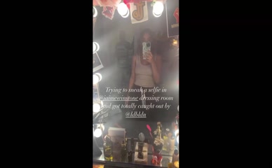 Frankie Bridge caught topless in dressing room selfie.