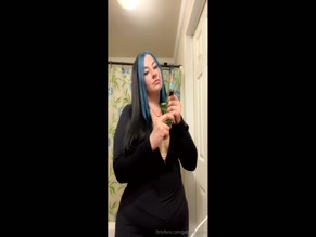 Goddessganja rips bong, exhales smoke