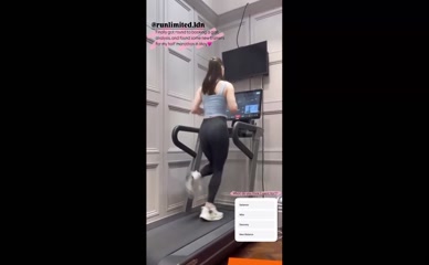 Nomi Teee fully clothed in tight athletic wear on treadmill