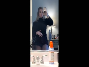 heartxsigh fully clothed mirror selfie of torso and legs in black shirt and shorts