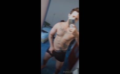 Man in underwear touching himself.