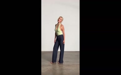 Millie Bobby Brown fully clothed posing in various outfits