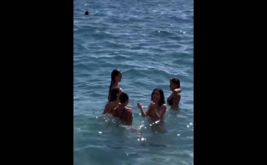 Mackenzie Ziegler and friends in the ocean.