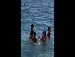 Mackenzie Ziegler and friends in the ocean.