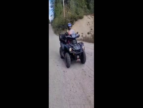 fanisparksfree bare shoulders, covered torso, pants, helmet, ATV