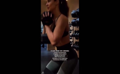 Courtney Hope gym workout in sports bra and leggings