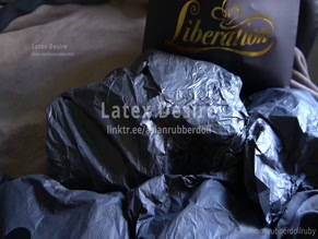 rubberdollruby00:00 New shiny rubber fetishwear unboxing