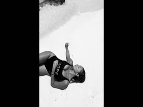 Anita Celestino topless beach photoshoot