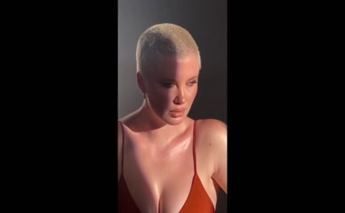 Ireland Baldwin's Bare Chest and Shaved Head
