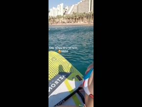 Hadar Simon bikini cleavage paddleboarding