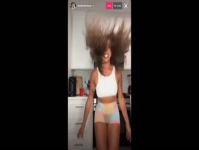 Brittany Renner flashing her boobs in the kitchen