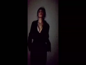 Dafne Keen cleavage deep V dress