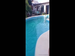 littlebetsy00:00 female in pool fully covered in swimsuit
