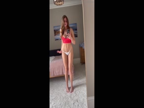 naturegirlnat Exposed breast cleavage in red top and white bikini bottom