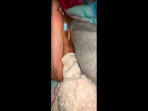 Lil_baddie479's soles and toes with light blue polish.