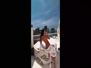 Elma Bayliss topless on balcony