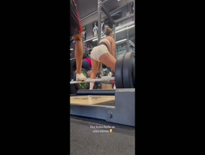 Caro Igc sumo deadlifts in gym.