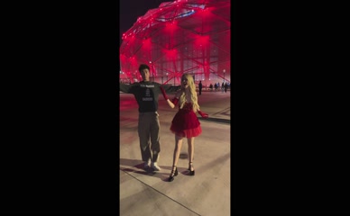 Mckenna Grace dances in red dress.