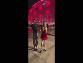 Mckenna Grace dances in red dress.