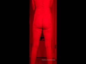 goddesslooloo Rear exposed ass and thong in red light.