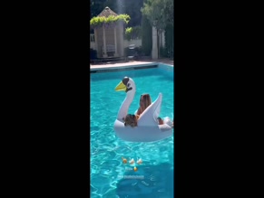 Kimberley Garner bikini pool swan dog.
