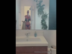 lolalorraine34h  bathroom mirror showing her cleavage and thong